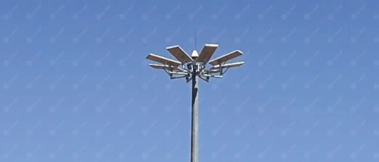 Daylight view of a solar high mast with multiple panel-mounted light heads
