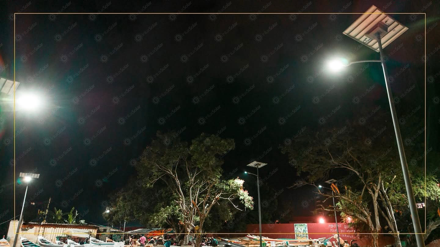 Close night view of a split type solar street light pole near a fishing area