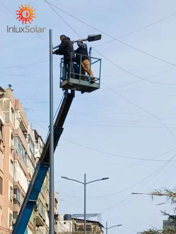 Bucket lift installation of a street light pole in Beirut business core area