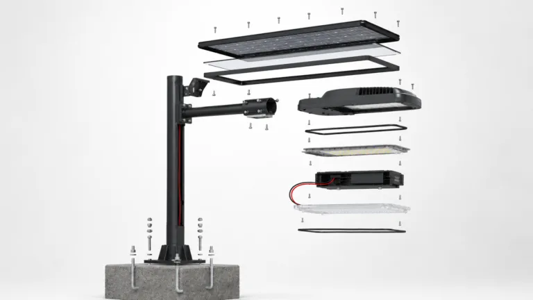 Exploded view of street light materials including pole, LED luminaire, lens, wiring, foundation and fasteners